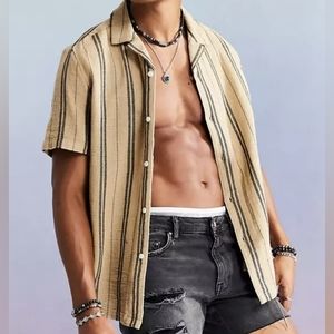 ASOS Design relaxed fit camp collar textured striped shirt in beige. Size Medium